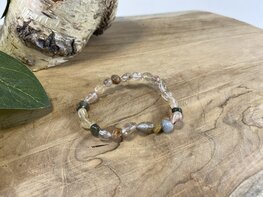 Rutielkwarts trommelsteen armband